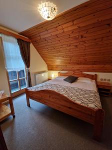 Voodi või voodid majutusasutuse Guesthouse Jelenov greben toas