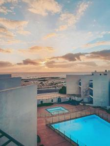 a view of the ocean from the balcony of a hotel at Casa Aloe Vera in Cotillo