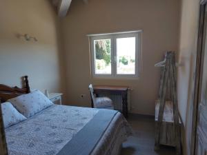 Łóżko lub łóżka w pokoju w obiekcie Apartamentos Nordeste