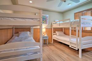 a bunk bed room with two bunk beds at Moses Lake Retreat with Salt Water Hot Tub! in Moses Lake