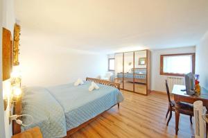 Posteľ alebo postele v izbe v ubytovaní DolceVita Apartments N 304 Rialto Mercato