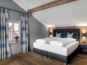 Postel nebo postele na pokoji v ubytování Landgasthof Hotel Linde