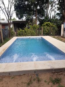 Bazén v ubytování LA SOÑADA Pesca y Cabañas nebo v jeho okolí