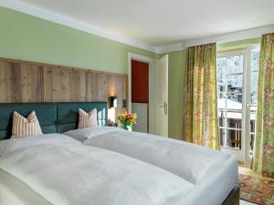 Postel nebo postele na pokoji v ubytování Landgasthof Hotel Linde