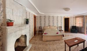 Katil atau katil-katil dalam bilik di Matua guest house