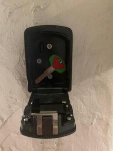 a black electrical outlet with a bird on it at Minerva Lodge - Panoramico centro storico Terracina in Terracina