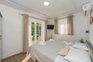 Postel nebo postele na pokoji v ubytování Villa San Antonio - Heated pool + 37 fotografií