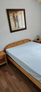 Postel nebo postele na pokoji v ubytování Bel appartement avec vue