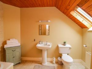Koupelna v ubytování Coach House + 18 fotografií