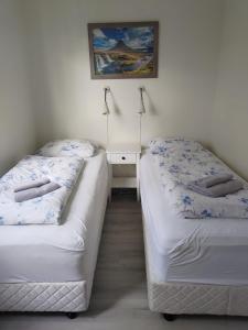 Postel nebo postele na pokoji v ubytování Rauðsdalur