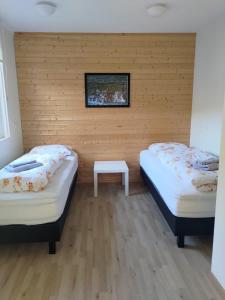 Postel nebo postele na pokoji v ubytování Rauðsdalur