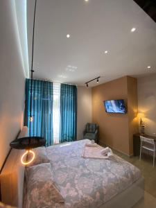 Postel nebo postele na pokoji v ubytování apartamente Melodi