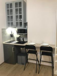 Kuchyňa alebo kuchynka v ubytovaní Deviza Apartments