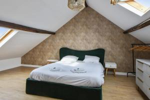 Posteľ alebo postele v izbe v ubytovaní Appartement Pierre-Paul - Welkeys