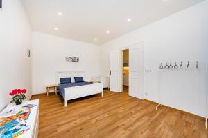 Posteľ alebo postele v izbe v ubytovaní Pat & Mat Apartment