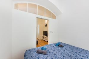 Posteľ alebo postele v izbe v ubytovaní Pat & Mat Apartment