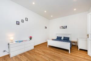 Posteľ alebo postele v izbe v ubytovaní Pat & Mat Apartment