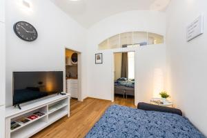TV a/nebo společenská místnost v ubytování Duplex Apartment