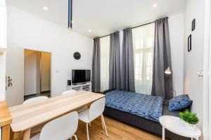 Posteľ alebo postele v izbe v ubytovaní Pat & Mat Apartment