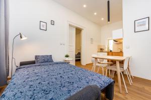 Posteľ alebo postele v izbe v ubytovaní Pat & Mat Apartment