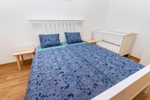 Posteľ alebo postele v izbe v ubytovaní Pat & Mat Apartment
