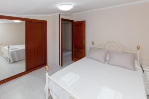 Postel nebo postele na pokoji v ubytování Casa Adriana