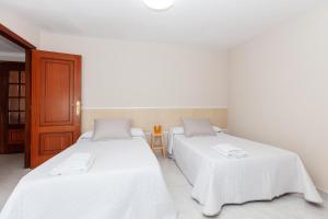Postel nebo postele na pokoji v ubytování Casa Adriana