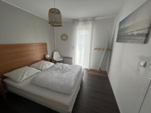 Ένα ή περισσότερα κρεβάτια σε δωμάτιο στο Villa Moana Soustons plage / Vieux-Boucau +27 φωτογραφίες