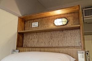 Postel nebo postele na pokoji v ubytování 拉開門輕旅 Le Passage Hostel