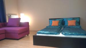 Posteľ alebo postele v izbe v ubytovaní Apartman 4 you Wellness + 10 fotografií