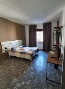 En eller flere senge i et værelse på B&B De Matha House