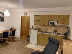 Η κουζίνα ή μικρή κουζίνα στο Apartmán Horní Mísečky