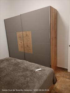 Posteľ alebo postele v izbe v ubytovaní Schöne Wohnung in Puerto de la Cruz mit Garten.