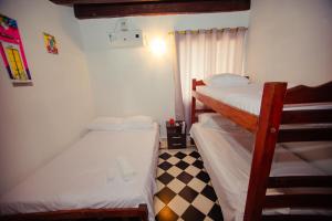 Casa Hotel Marbella Beach客房内的一张或多张床位