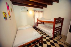 Casa Hotel Marbella Beach客房内的一张或多张床位