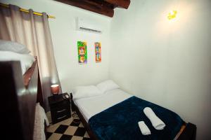 Casa Hotel Marbella Beach客房内的一张或多张床位