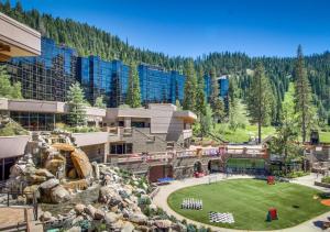 a view of a resort with a water park at Everline Resort & Spa Rentals by TO in Olympic Valley