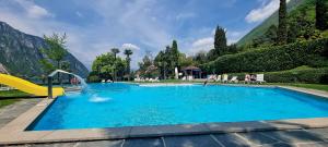 Bazén v ubytování Holiday Suite 304 Residenza Lago di Lugano nebo v jeho okolí