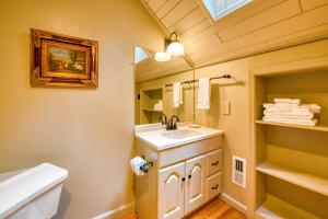 a bathroom with a sink and a toilet at Laurel Cabin in Cashiers