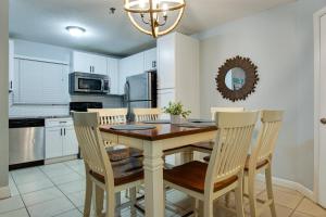 a kitchen with a dining room table and chairs at Beach side condo at Hilton Head Resort Villas in Hilton Head Island