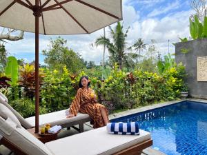 Bazén v ubytování Danakha Villa Ubud nebo v jeho okolí