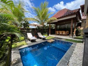 Bazén v ubytování Danakha Villa Ubud nebo v jeho okolí