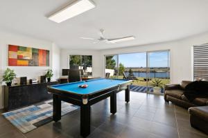 a living room with a pool table at Big Blue Tailem Bend in Tailem Bend