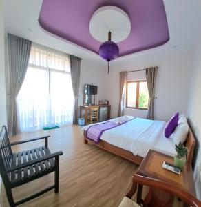 Postel nebo postele na pokoji v ubytování Ms Tri Homestay