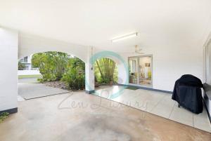 a room with a swimming pool in a house at ZEN TREETOPS - Boutique 2-BR Apt w/ Private Pool in Larrakeyah