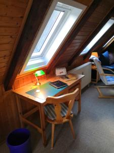 a desk in a room with a window at Haus Fessel - Zeterklippe in Elend