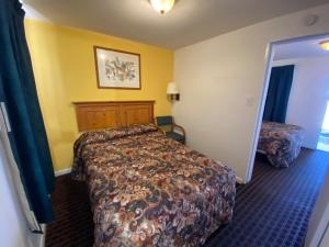 Postel nebo postele na pokoji v ubytování RANGER MOTEL