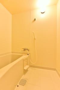 A bathroom at Arya Hotel Alpin Route / Vacation STAY 8237