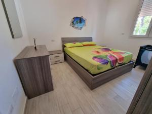 Postel nebo postele na pokoji v ubytování Villa Edoardo con pineta a 250 metri dal mare