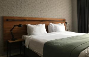Voodi või voodid majutusasutuse Hotel Stancia Kazbegi - City Center toas